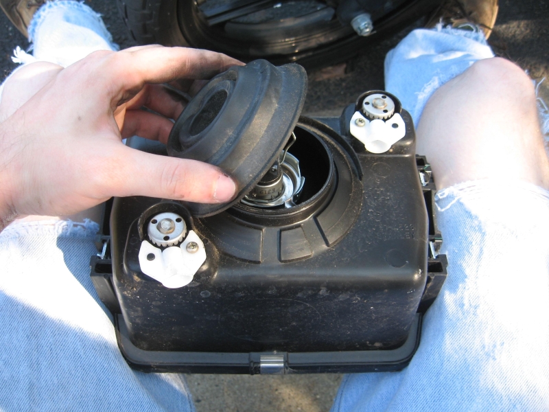 File:Headlight remove rubber cover2.jpg
